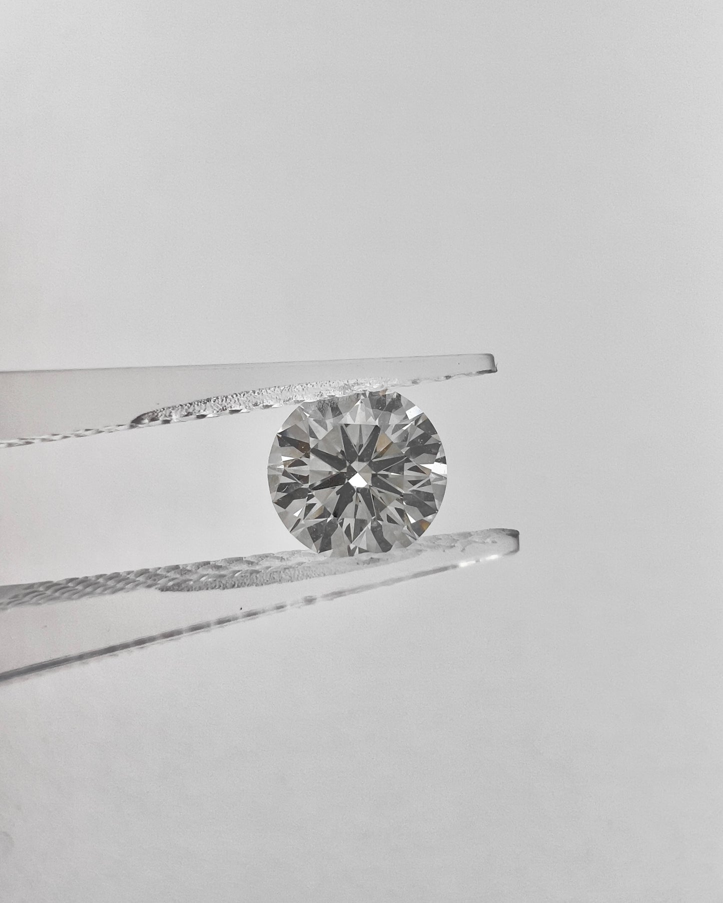 Natural Round 0.91ct H VS2 AGS 1926105